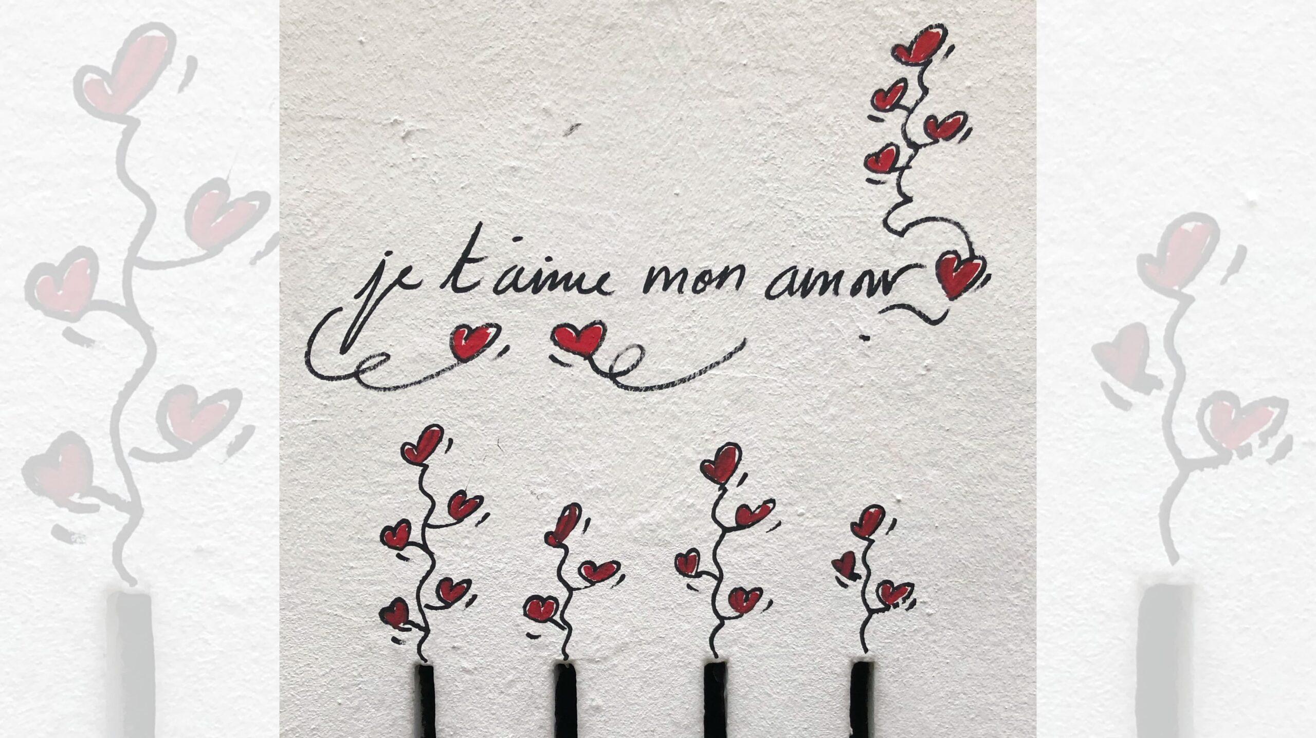 Oeuvre murale réalisée par l'artiste In Love à Paris avec de multiples coeurs et où il est écrit : "je t'aime mon Amour"